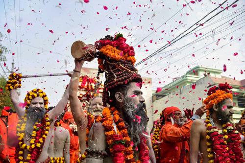 Millions of devotees make a pilgrimage to the biggest festival in Hinduism despite the risk of infection with Covid-19